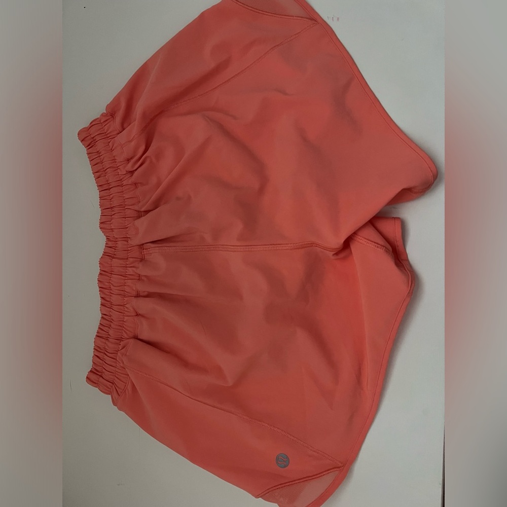 size 6 four inch peach lululemon hotty hot shorts